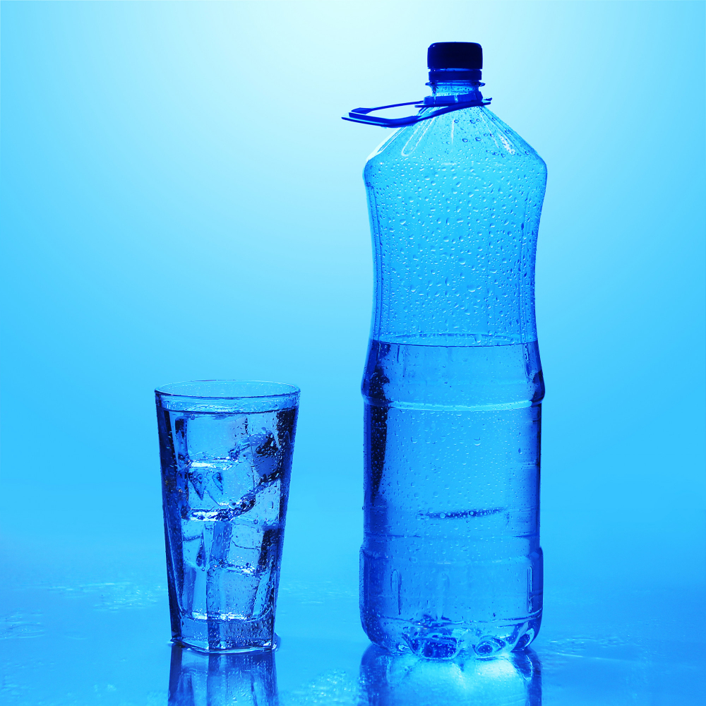 Water Bottle and Glass of Alkaline Water