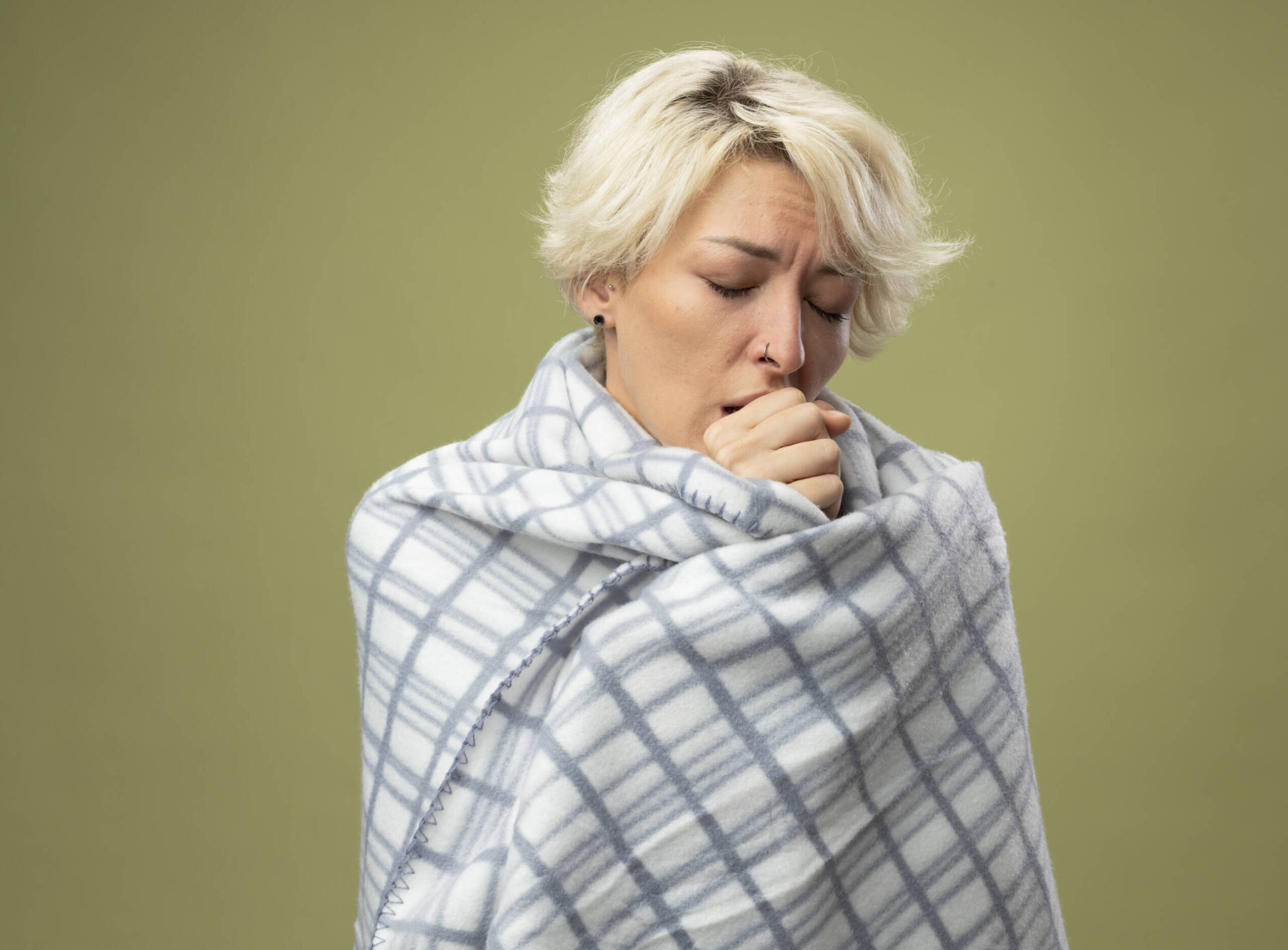 Woman coughing and sick