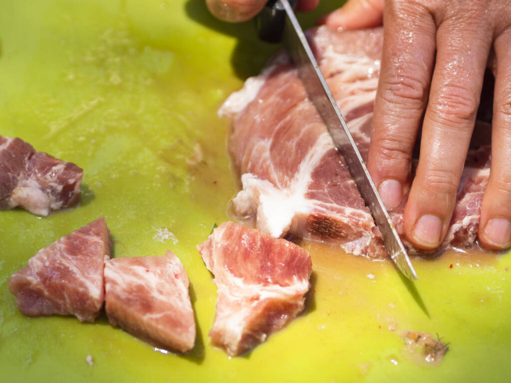 Chef carving meat