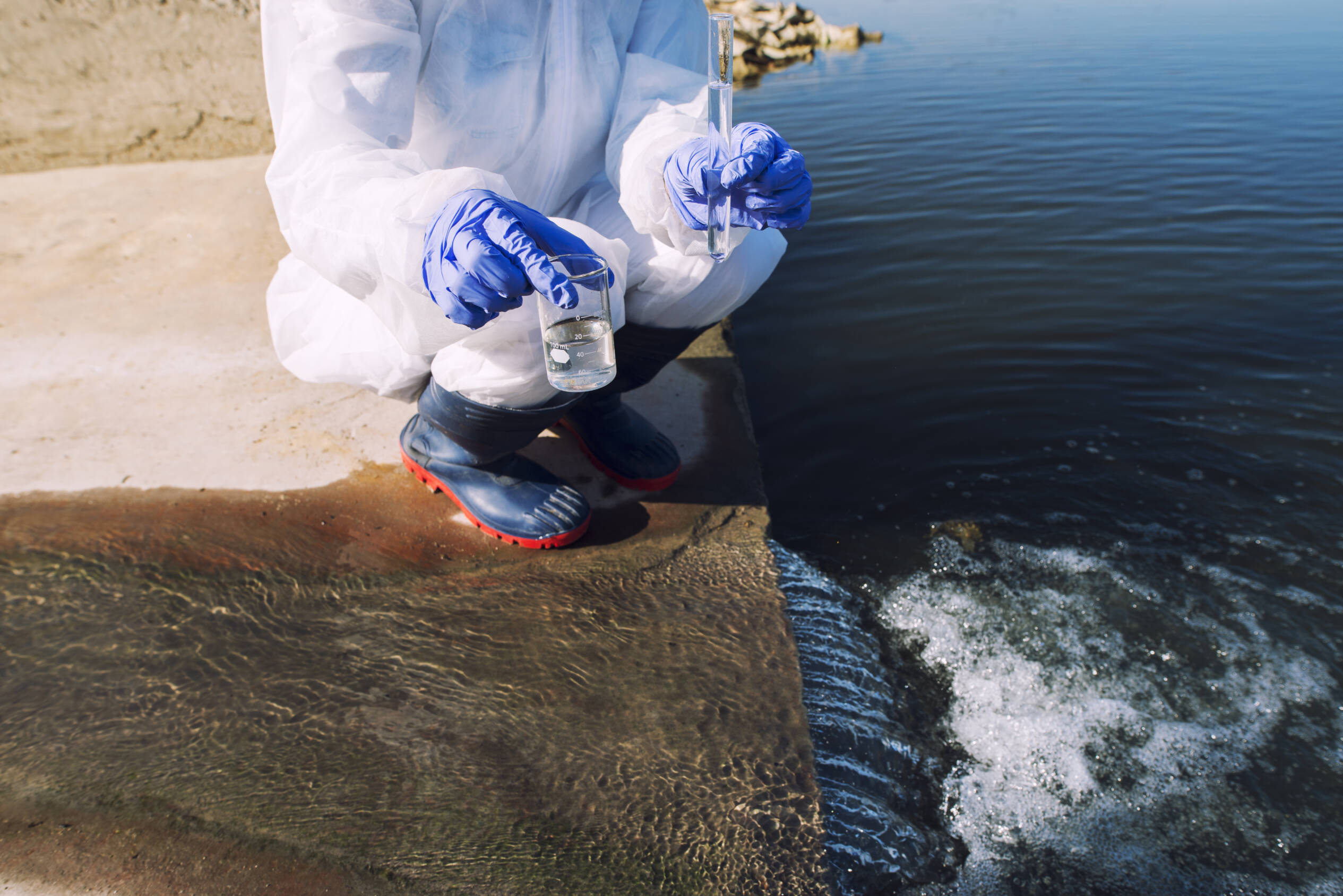 Ecologist taking a water sample